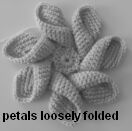 crochet flower hot pad petals loosely folder