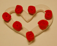 clay rose wreath pin image 6